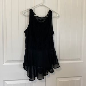 Black high low peplum top. Size large. Back is see through.